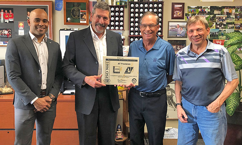photo: AT Precision receives award recognizing 20 years of ISO certification.